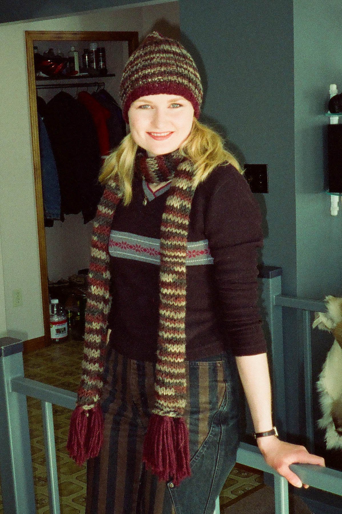 Talena modelling her first scarf and toque projects.
