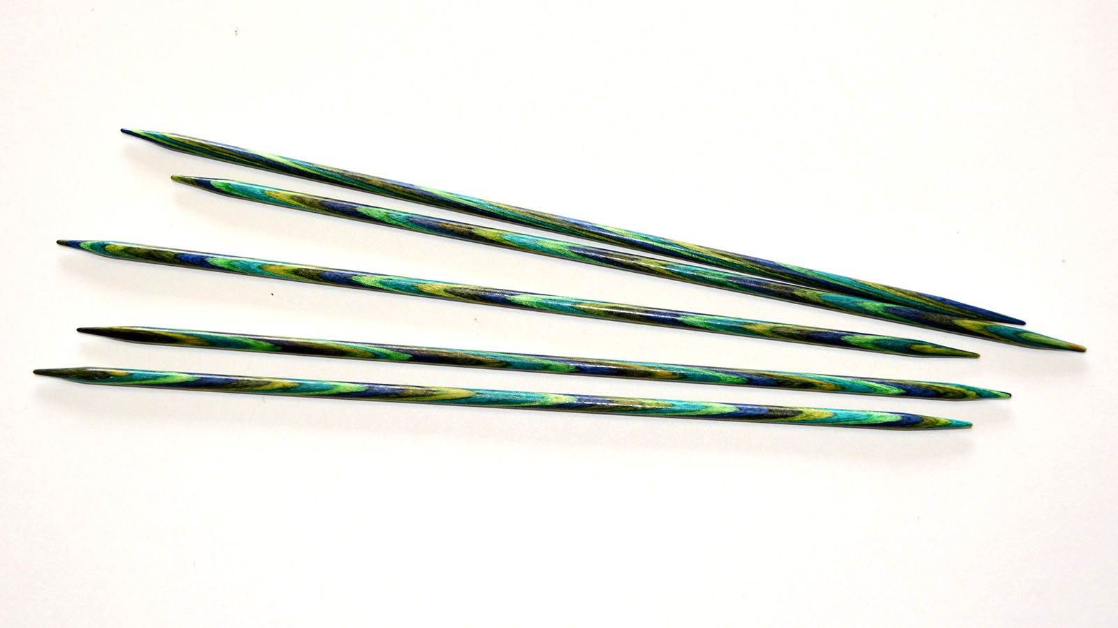 Set of five double-pointed needles.